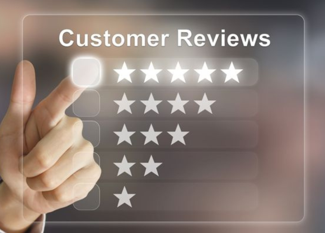 Image of a hand touching a virtual screen with a five-star rating system labeled "Customer Reviews."